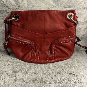 B. Makowsky red leather handbag